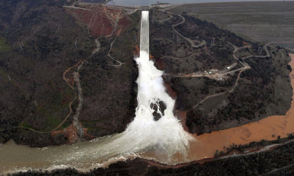 The Oroville Dam spillway releases 100,000 cubic feet of water per second down the main spillway, on Feb. 13. Photo: Josh Edelson, AFP via Getty Images