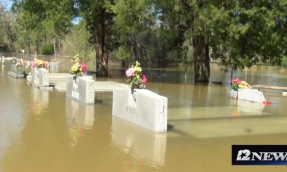 Louisiana's flood waters are causing caskets to float to the surface. Photo from Starks, La., March 15, 2016. Photo: KPLC