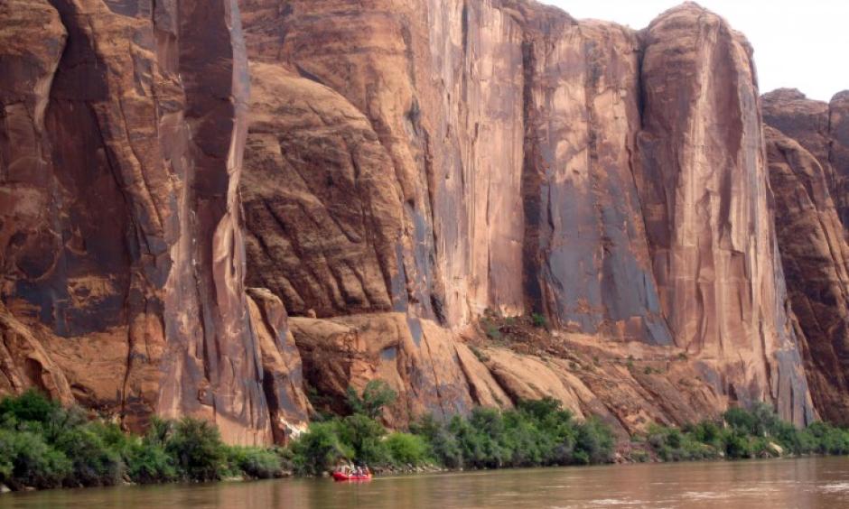 Rafters float down the Colorado River near Moab, Utah, July 25, 2017. Scant snow in the mountains that feed the Colorado River means the river will probably send less than half the normal amount of runoff into Lake Powell this spring. Credit: Dan Elliot, AP