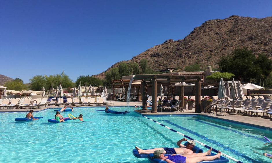 Hotel guests cool off at the pool at the JW Marriott Scottsdale Camelback Inn Resort and Spa in Paradise Valley, Ariz., on Sunday, June 19, 2016. States in the Southwest are in the midst of a summer heat wave as a high pressure ridge bakes Arizona, California and Nevada with extreme, triple-digit temperatures. Photo: Anna Johnson, AP