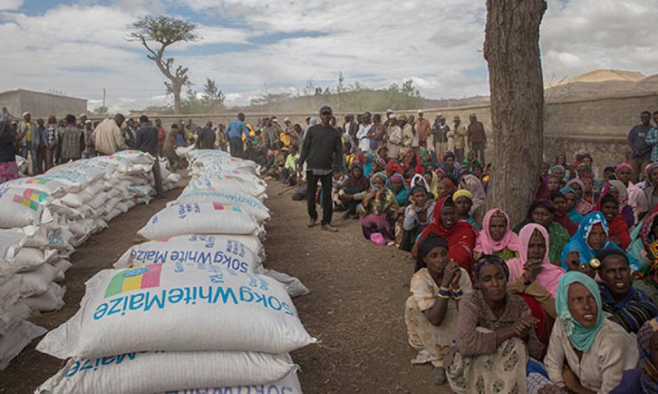 Ethiopians in the rural Ziway Dugda district await distribution of emergency food aid in January. Photo: Mulugeta Ayene, AP