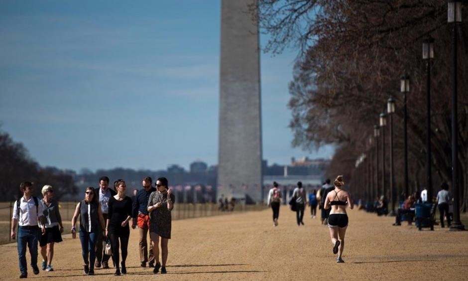 People on the Mall during warm weather Feb. 23, 2017, in Washington. Photo: Brendan Smialowski, Agence France-Presse via Getty Images