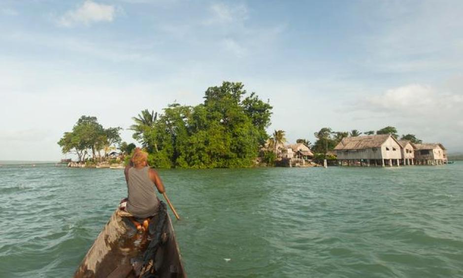 At high tide, Lau Lagoon's manmade islands barely rise above the waterline. During king tides and
strong winds, which are becoming increasingly frequent, some islands are now completely submerged. Photo: Beni Knight