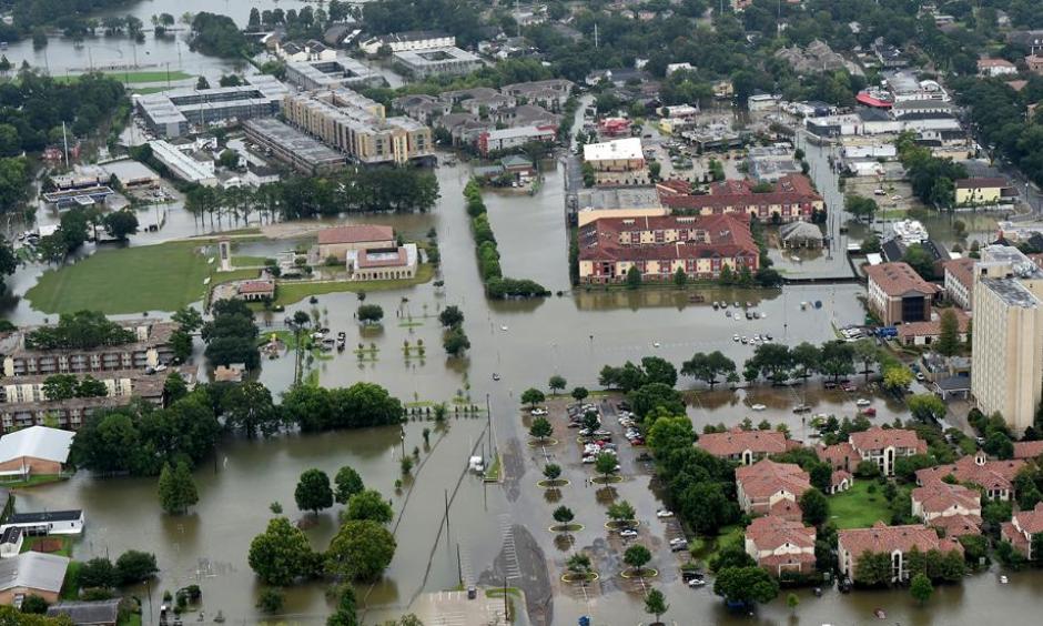 This aerial image shows flooded areas on and near the campus of Louisiana State University (LSU), Saturday, Aug. 13, 2016, in Baton Rouge, La. Photo: Patrick Dennis / The Advocate via AP