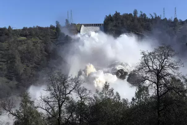 Water is released down the damaged primary spillway in Oroville on Feb. 14. Photo: Michael Short, Bloomberg