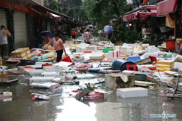 Boxes scatter on a flooded road in typhoon-hit Xiamen City, southeast China's Fujian Province, Sept. 15, 2016. Typhoon Meranti made landfall in Xiamen in the early morning on Thursday, with gales up to 48 meters per second. Photo: Zeng Demeng, Xinhua