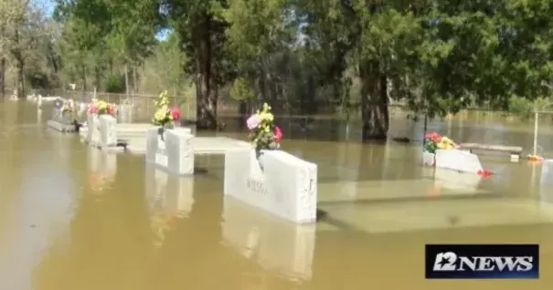 Louisiana's flood waters are causing caskets to float to the surface. Photo from Starks, La., March 15, 2016. Photo: KPLC