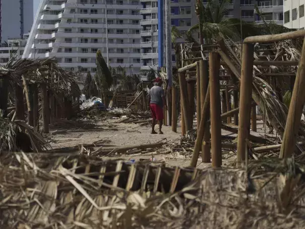 Hurricane Otis devastated the Mexican city of Acapulco, after rapidly intensifying over abnormally warm ocean water. A new study finds it is unlikely that humans will successfully limit average global warming to 1.5 degrees Celsius, the lower target set by the 2015 Paris agreement. (Credit: Marco Ugarte/AP)