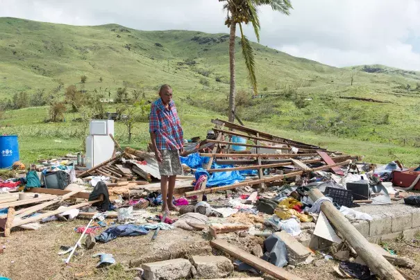 Damages from cyclone Winston in Fiji has exceeeded $470 million. In this photo, by the Mai Life Magazine, Naresh Kumar of Tuvu Lautoka looks at the remains of his house after it was destroyed by Cyclone Winston in Tuvu Lautoka on Feb. 22, 2016 in Fiji. Photo: Feroz Khalil, Getty Images 