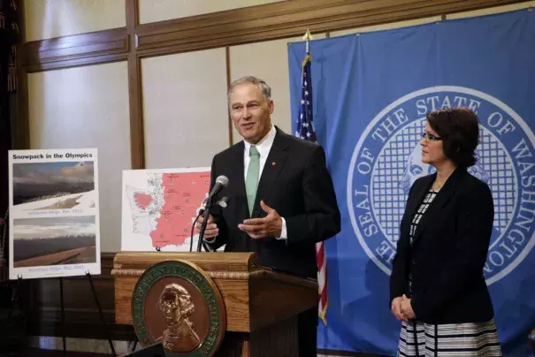 Washington Gov. Jay Inslee talks to the media about his statewide drought emergency as state ecology director Maia Bellon looks on, Friday, May 15, 2015, in Olympia, Wash. Credit: AP