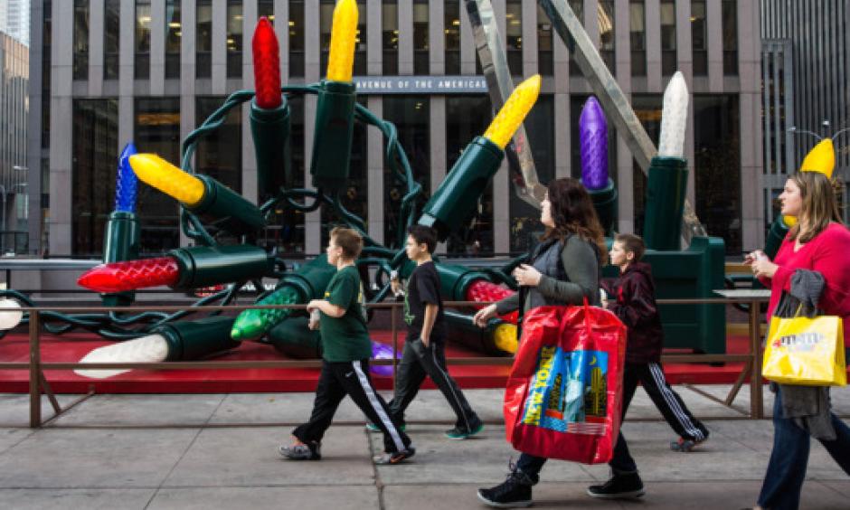 Children walk down Sixth Avenue wearing t-shirts on December 10, 2015. Photo: Andrew Burton/2015 Getty Images
