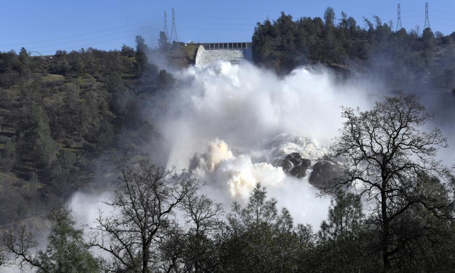 Water is released down the damaged primary spillway in Oroville on Feb. 14. Photo: Michael Short, Bloomberg