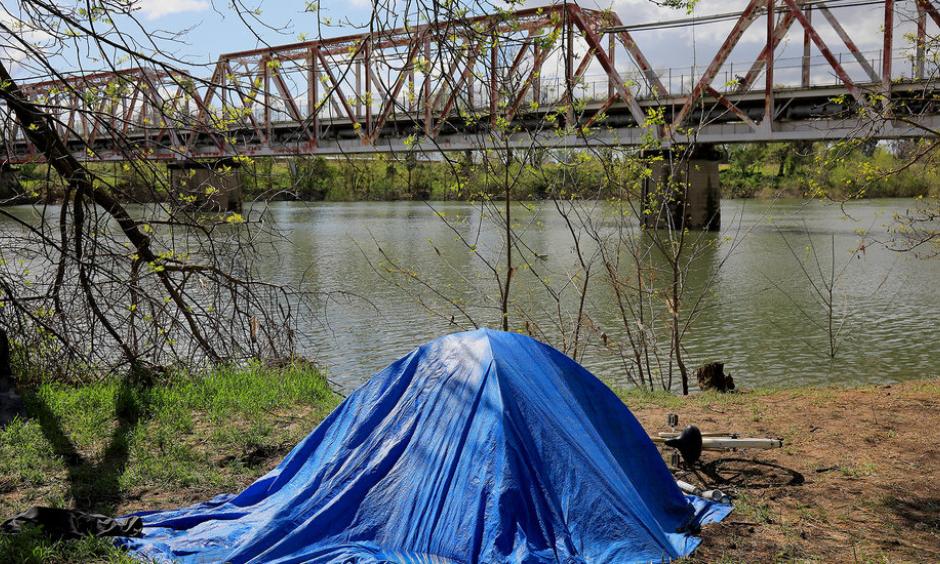 A homeless campsite along the American River in Sacramento in March. Photo: Jim Wilson, The New York Times