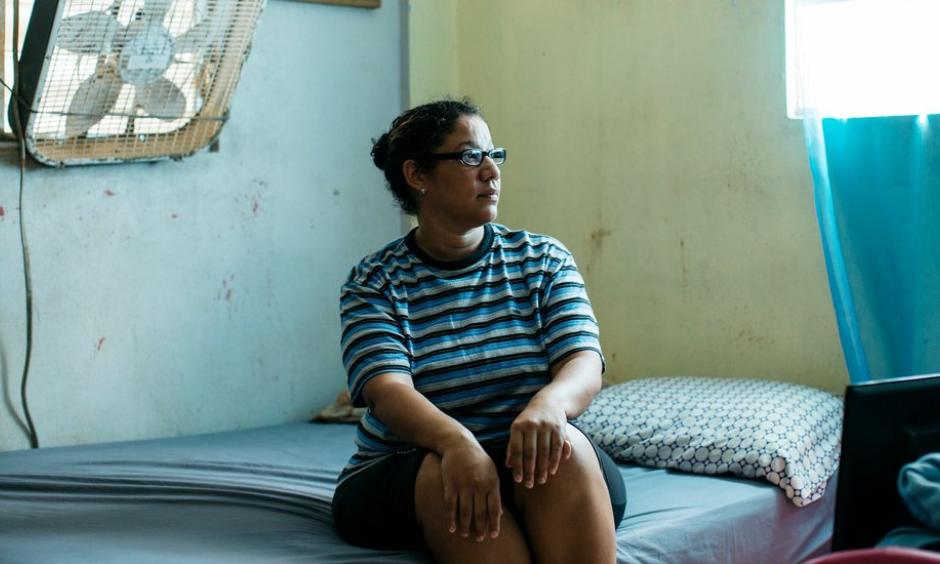 Milagros Serrano Ortiz at her home in Toa Baja, P.R., where at least nine people died and water levels peaked over 12 feet during Hurricane Maria. Photo: Erika P. Rodriguez for The New York Times