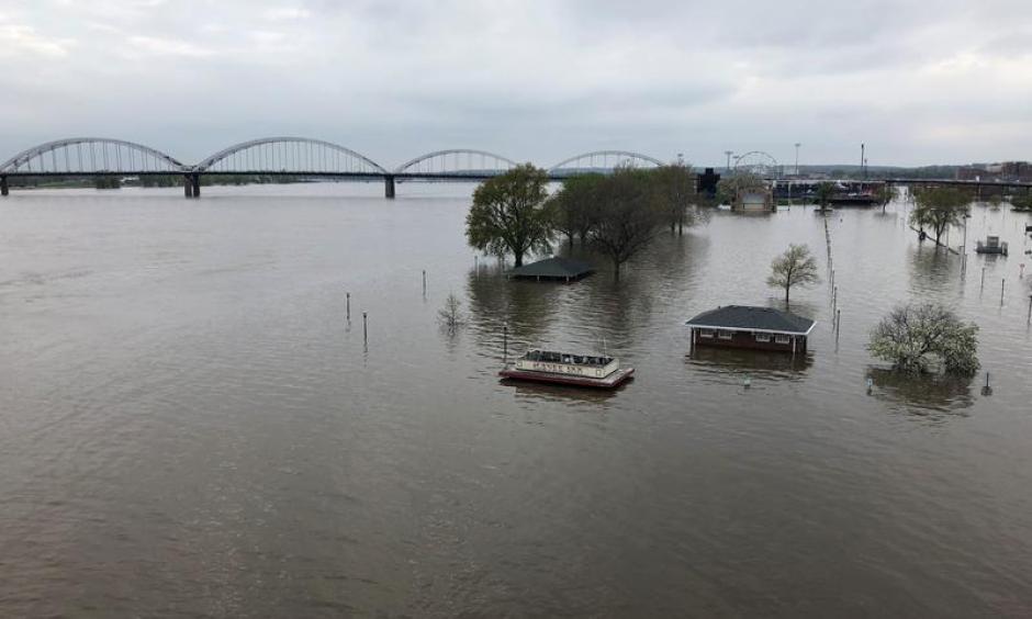 The flooded Mississippi River swamped portions of downtown Davenport this spring, reaching record-high levels in the area, following a wet fall and a snowy winter. Photo: Kate Payne, IPR