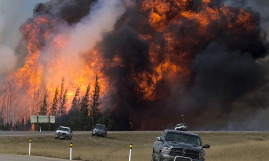 A wildfire burns near Fort McMurray, Alberta, Canada, on May 7. Photo: Premier of Alberta/flickr