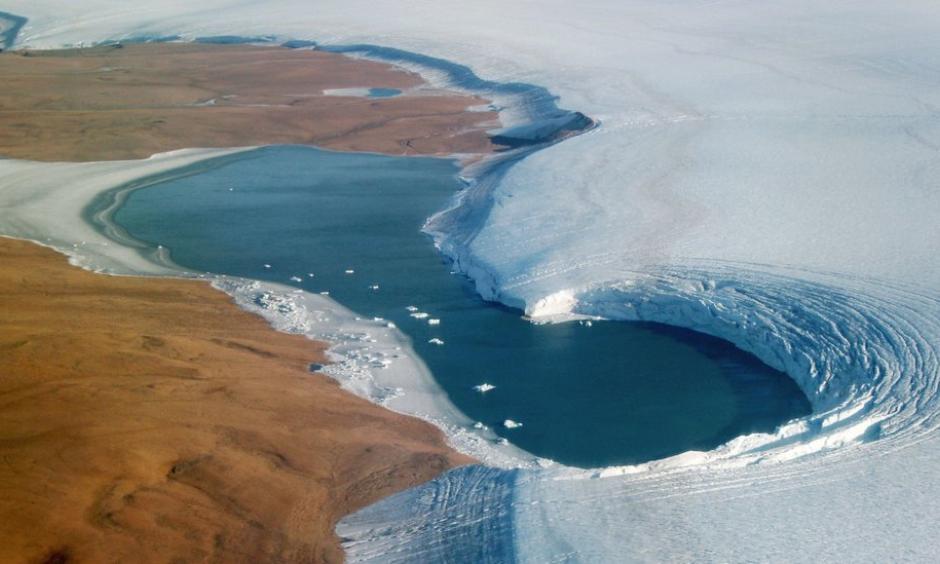 A lake on the edge of the Humboldt Glacier in Greenland in September. Credit: NASA/EPA