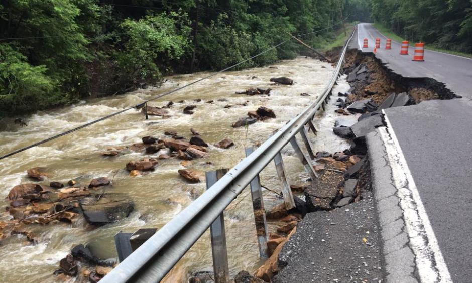 A powerline toppled into Brackens Creek next to a washout of WV Route 60 between Lookout and Hilton VIllage. Photo: Rebecca Lindsey