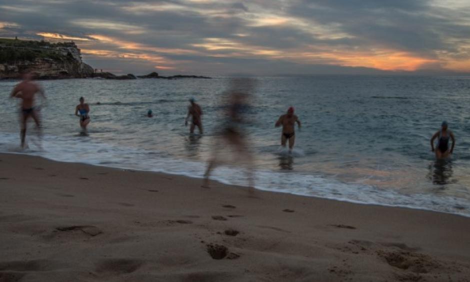 Swimmers enjoy the warm weather at Coogee Beach on Tuesday. Photo: Wolter Peeters