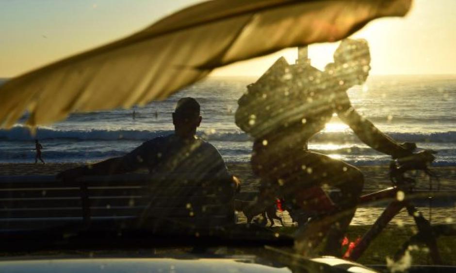 A warm dawn brought plenty of surfers and swimmers out on the Northern Beaches. Photo: Nick Moir