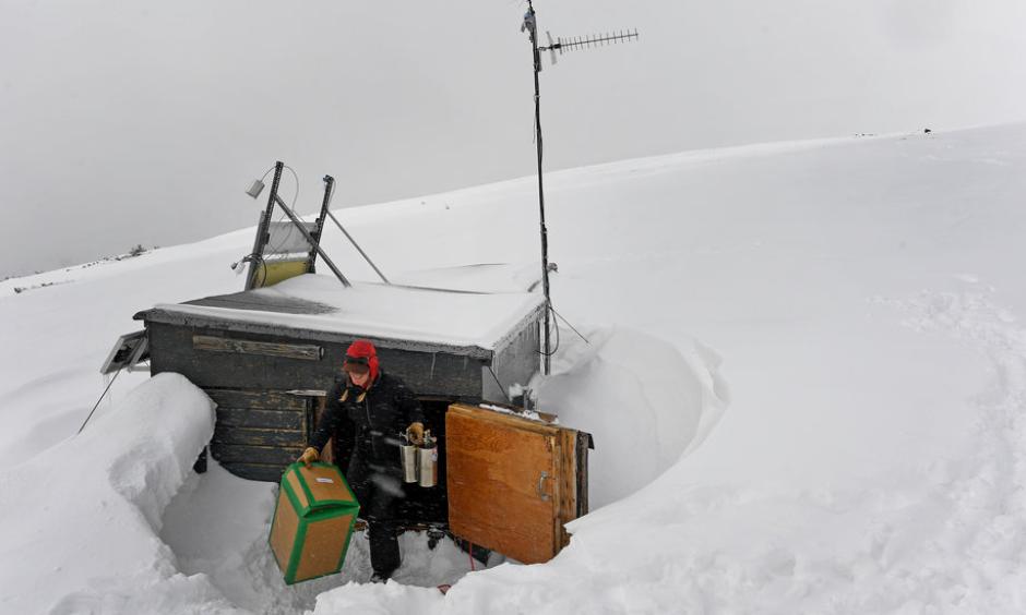 In March, Jennifer Morse, a climate technician, unloaded air sampling equipment into the small wooden shed used to collect data at the Niwot Ridge research site of the National Oceanic and Atmospheric Administration near Nederland, Colo. Photo: Helen H. Richardson, The Denver Post, via Getty Images