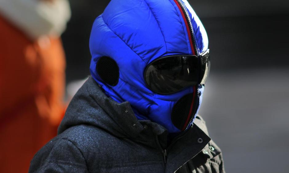 A bundled-up pedestrian walks along Summer Street amid cold weather in Boston on Jan. 2, 2017. Photo: Lane Turner, The Boston Globe via Getty Images