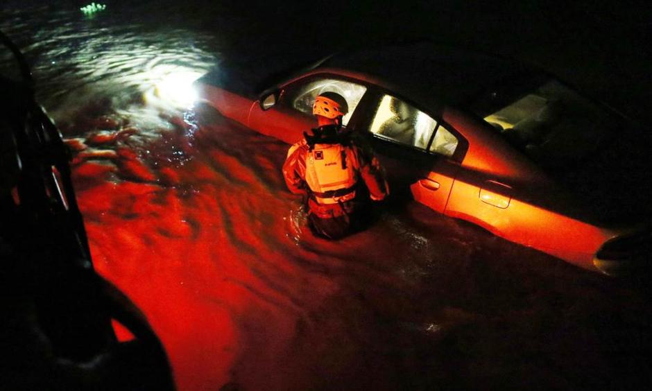 A rescue team inspects flooded areas after Hurricane Irma stuck Fajardo, Puerto Rico on Wednesday. Photo: Jose Jimenez / Getty Images