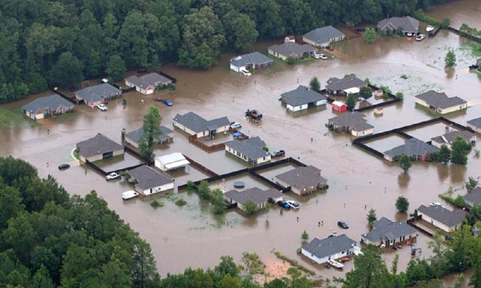 This aerial photo shows flooded homes along the Tangipahoa River near Amite, La., Saturday, Aug. 13, 2016. Photo: Ted Jackson / NOLA