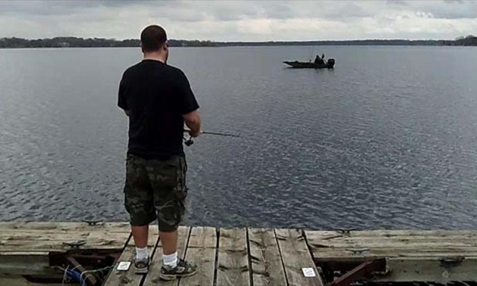 Corey Millar, of White Bear Lake, angled for panfish, Tuesday, March 20, 2012, in the Commercial Bay of White Bear Lake. Photo: John Brewer