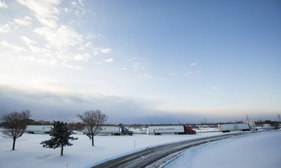 Trucks sit stranded on a closed New York state thruway in the town of Cheektowaga near Buffalo. Photo:Lindsay DeDario, Reuters