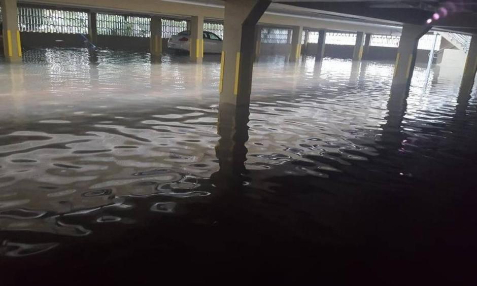 Water pools in a parking garage at 1441 Lincoln Rd. Wednesday evening during high tide. Photo: Valerie Navarrete