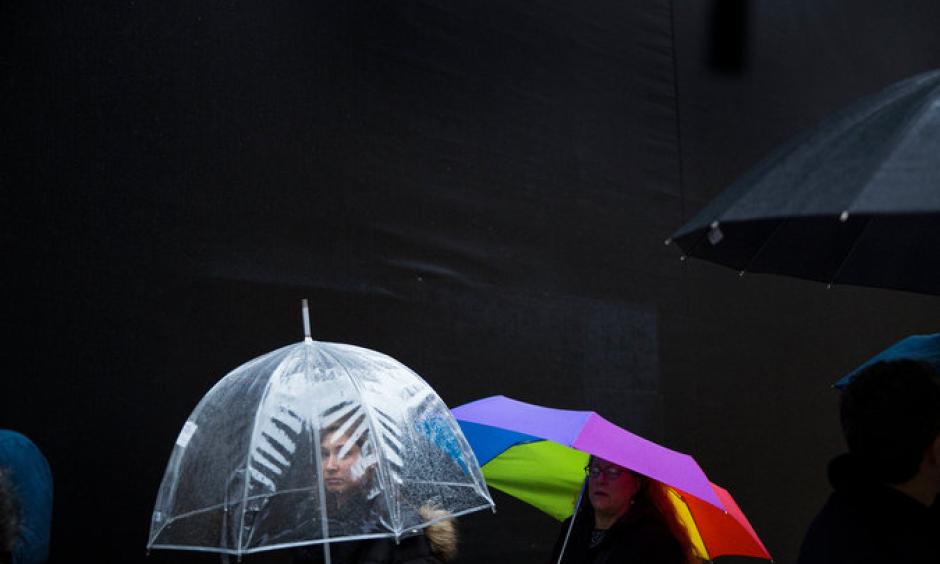 Tuesday was a warm and wet day in Manhattan. Image: Damon Winter, The New York Times