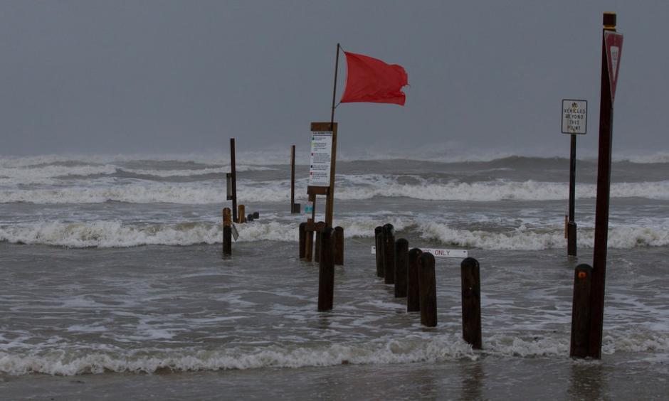 Rising waters at Bob Hall Pier in Corpus Christi, Texas, as Hurricane Harvey approached on Friday. Credit Courtney Sacco/Corpus Christi Caller-Times, via Associated Press