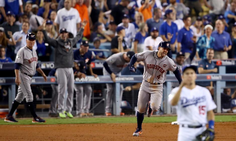 George Springer hit a two-run home run in the 11th to put the Astros up 7-5. Photo: Ezra Shaw/Getty Images