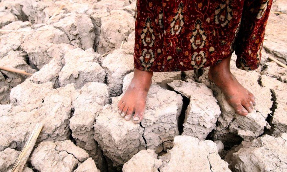 An Iraqi girl stands on former marshland, drained in the 1990s because of politically motivated water policies. Photo: Essam Al-Sudani, AFP, Getty Images