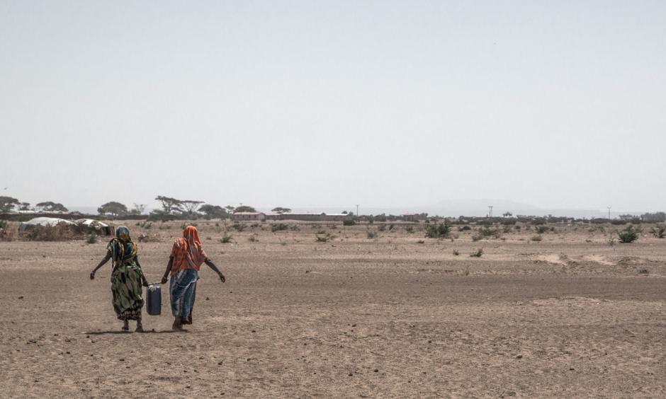 Women carry water back to their homes in drought-hit Aydora, Ethiopia. The country is facing its third straight year of drought. Photo: Aida Muluneh for The Washington Post