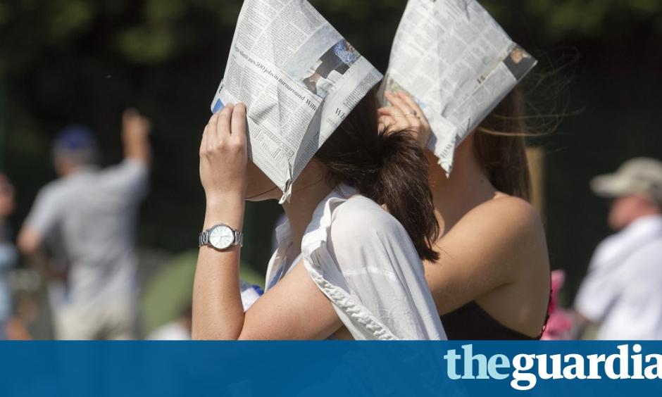 Tennis fans sought out what sheltered spots they could find. Photo: Amer Ghazzal, Rex Shutterstock