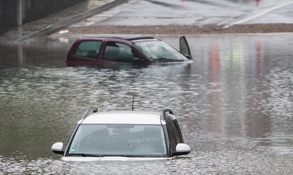 Cars are submerged in an underpass in Oberhausen after torrential rains caused flash floods across southern Germany. Photo: AP