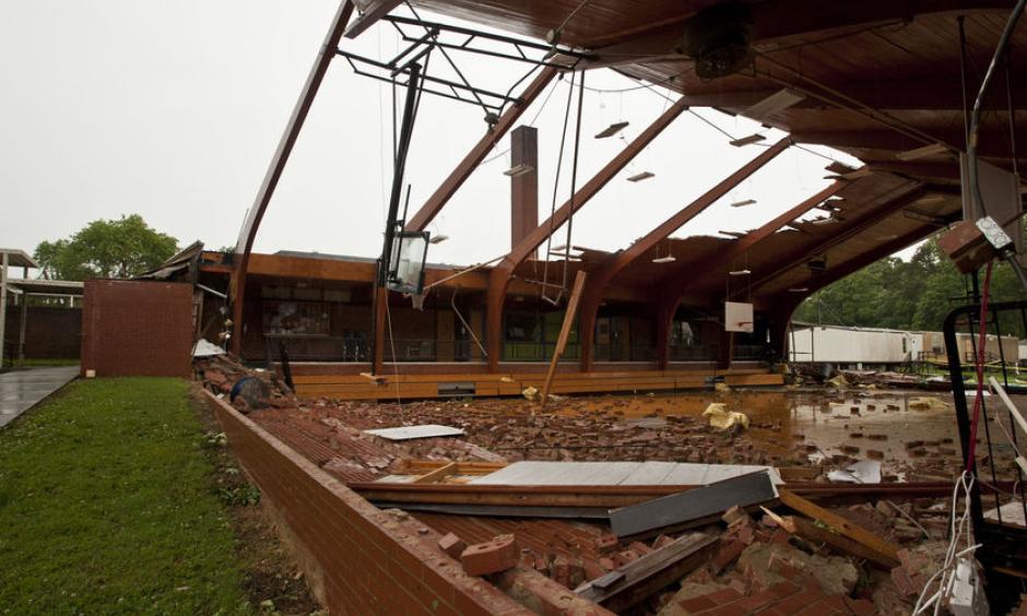 The roof was blown off the gym at Courtney Elementary School and the end walls were blown in by a tornado that passed through the area Wednesday. Photo: Walt Unks