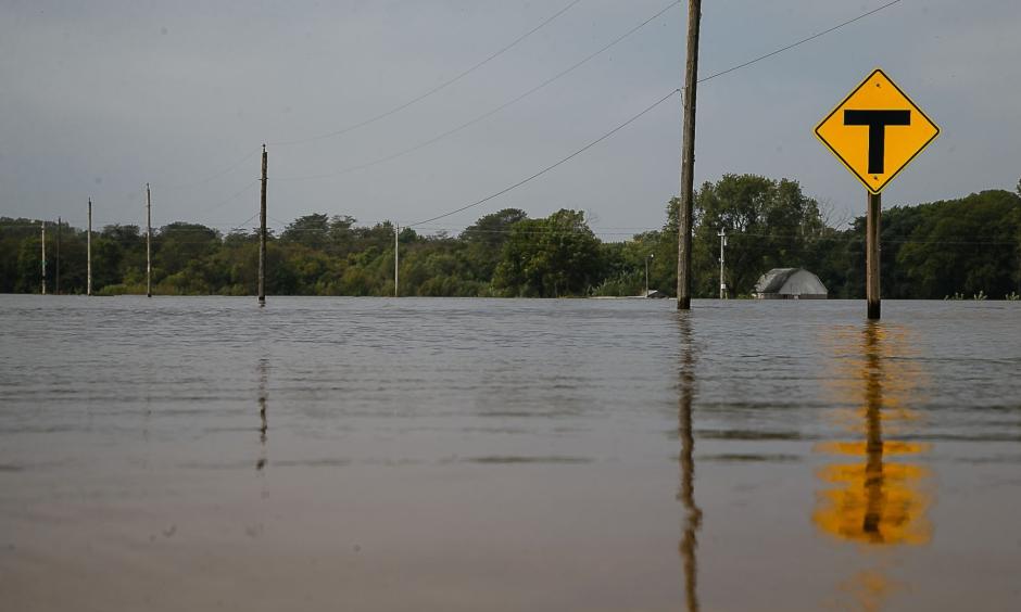A gravel road sits underwater on Saturday, Sept. 24, 2016, in Cedar Falls. Photo: Brian Powers, The Register