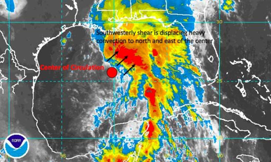 Southwesterly wind shear was displacing the heaviest convection to the north and east of the center of circulation for Potential Tropical Cyclone 3 this morning. Background image: NOAA, Markups: Hal Needham. Image: NOAA
