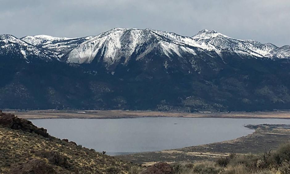 The view from the east side of Washoe Lake on Jan. 7 shows what snow drought looks on Slide Mountain and Mount Rose near Reno. Photo: Benjamin Hatchett, DRI
