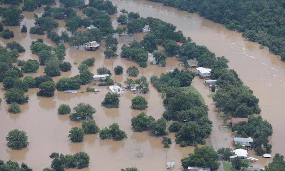 An aerial view of homes in the Horseshoe Bend area on the banks of the Brazos River in north central Texas on Wednesday, June 1, 2016. Residents of some rural southeast Texas counties braced for more flooding along the river that is expected to crest at a record level just two years after it had run dry in places because of drought. Photo: Brandon Wade, Star-Telegram via AP