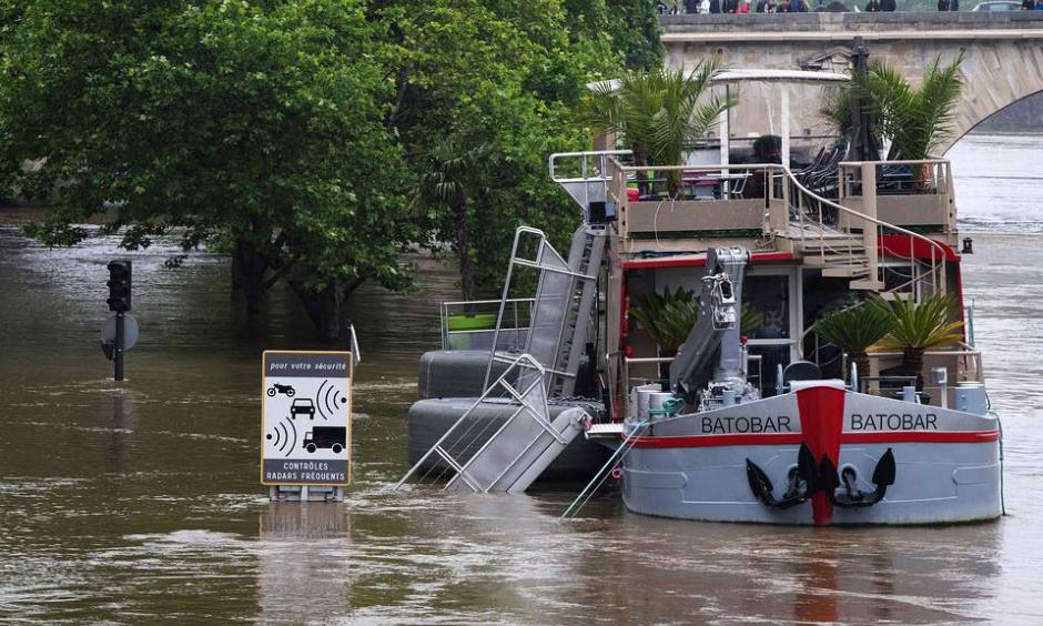 A lounge boat docked in the flooded Seine river in Paris. The rain-swollen river receded significantly on Sunday after reaching its highest level in three decades. Photo: Agence-France-Presse/ Getty Images
