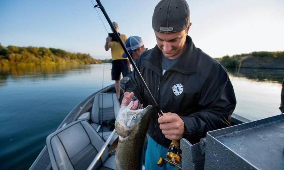 Shawn Gallagher of Costa Mesa catches a salmon on the Sacramento River in early September. Photo: Randall Benton