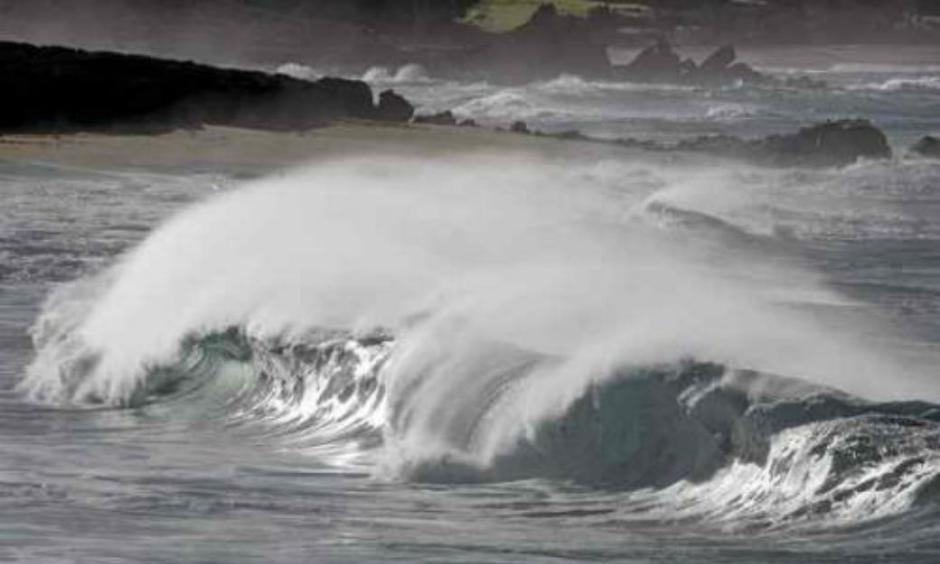 Large waves break at Carmel River State Beach on Friday. (Vern Fisher - Monterey Herald)