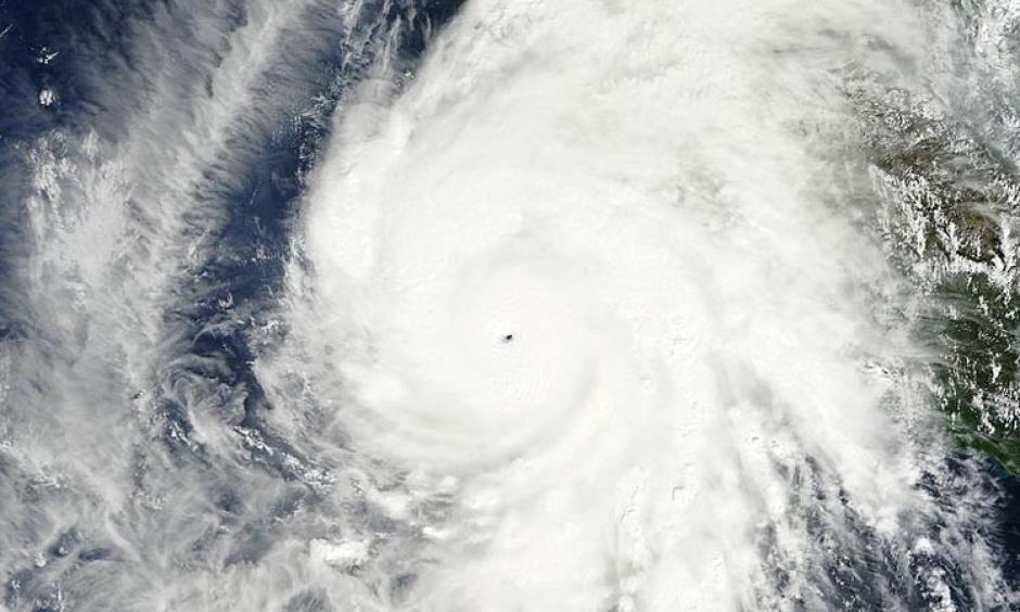 Hurricane Patricia as seen by the MODIS instrument on NASA's Terra spacecraft at 1:30 pm EDT October 23, 2015. At the time, Patricia had 205 mph sustained surface winds and a central pressure of 878 mb. Patricia had peaked at 215 mph sustained winds and a central pressure of 872 mb six hours previously. Image: NASA