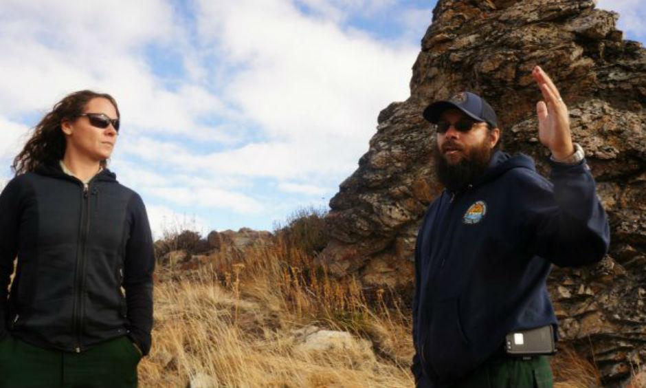 Carly Reed and Jeff Bouschor surveying the burn area.Grist | Ted Alvarez