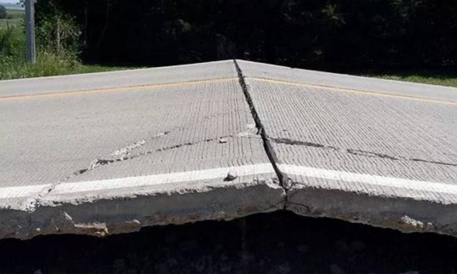 Highland Road near Atlantic, Iowa buckled in extreme heat on Saturday, when the heat index reached 101 °F. Photo: KJAN Radio, Jessica Tye Shroyer