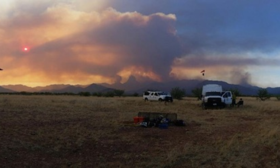 Helicopter-related firefighting efforts were limited on Sunday at the uncontained Brown Fire in far south Arizona, which has affected more than 8000 rugged acres in the Baboquivari Mountains southwest of Tucson. Believed to be caused by humans, the fire is now under investigation. Photo: AZ State Forestry.